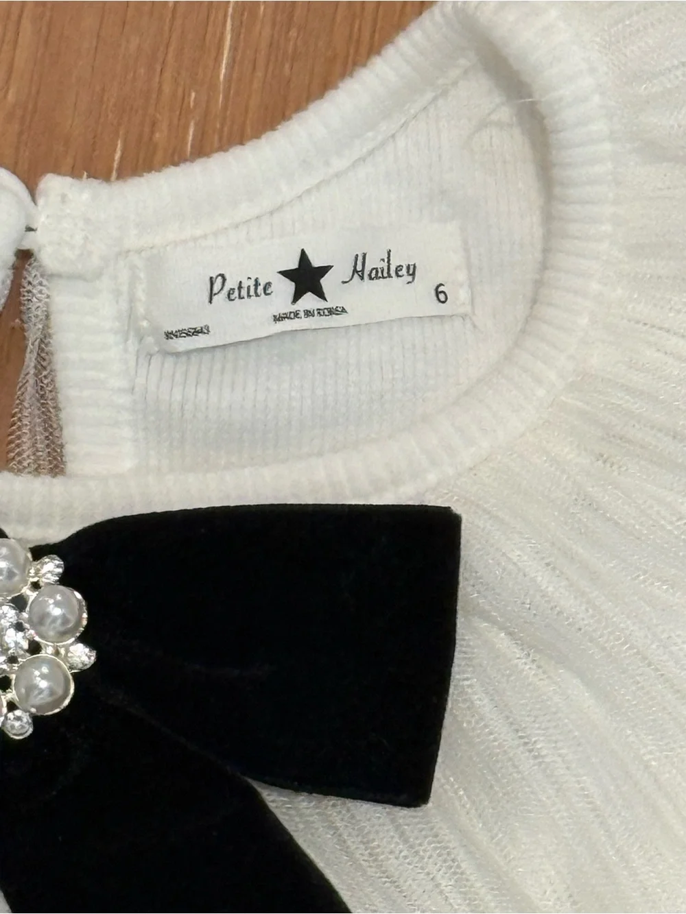 New, never worn. Size 6 Tulle Party Dress with Black Bow